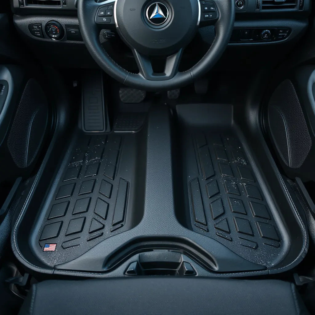 Dark all-weather floor liners with raised edges covering car footwells from winter to summer use